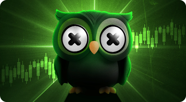 Green Duolingo owl mascot with Xs in its eyes, standing in front of candlestick chart graphics.